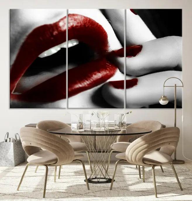 The wall features a black and white photo titled "Red Lips and Women Canvas Print," adding a touch of bold elegance to the room's contemporary art collection.