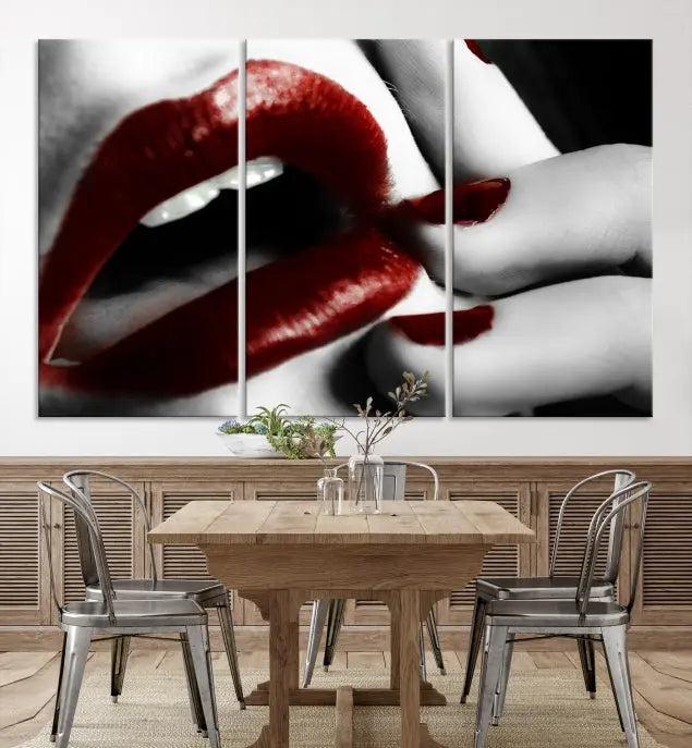 The wall features a black and white photo titled "Red Lips and Women Canvas Print," adding a touch of bold elegance to the room's contemporary art collection.