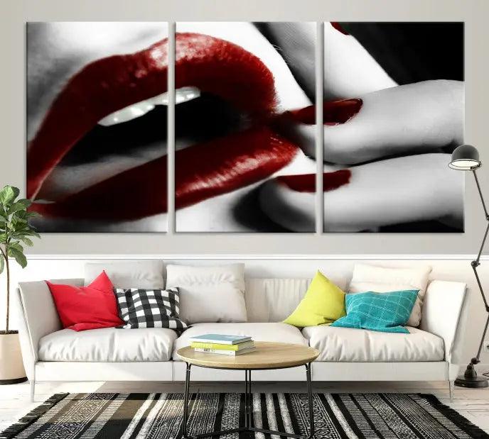 The wall features a black and white photo titled "Red Lips and Women Canvas Print," adding a touch of bold elegance to the room's contemporary art collection.