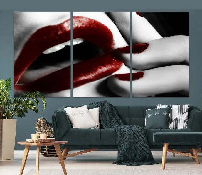 The wall features a black and white photo titled "Red Lips and Women Canvas Print," adding a touch of bold elegance to the room's contemporary art collection.