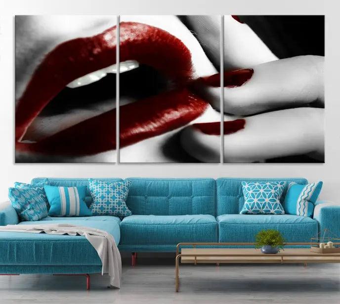 The wall features a black and white photo titled "Red Lips and Women Canvas Print," adding a touch of bold elegance to the room's contemporary art collection.