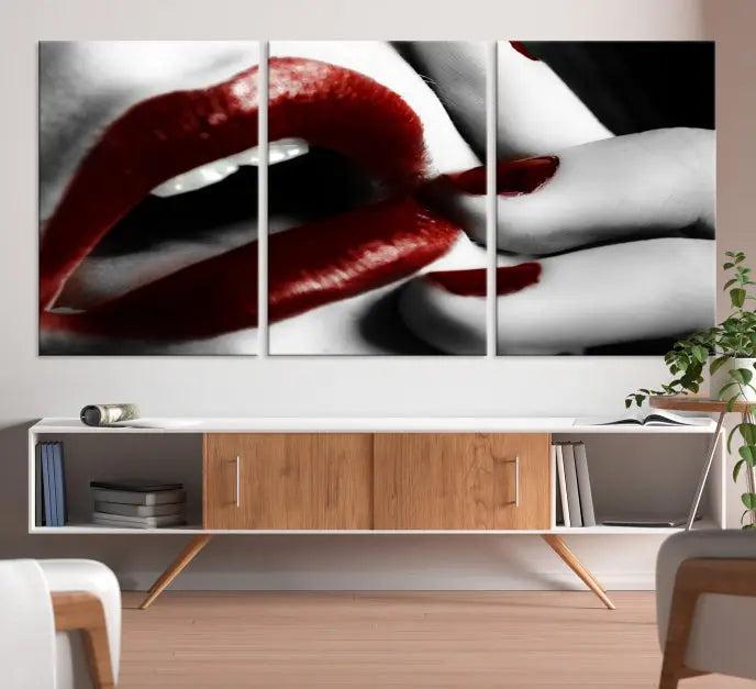 The wall features a black and white photo titled "Red Lips and Women Canvas Print," adding a touch of bold elegance to the room's contemporary art collection.