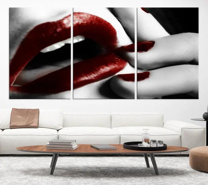 The wall features a black and white photo titled "Red Lips and Women Canvas Print," adding a touch of bold elegance to the room's contemporary art collection.