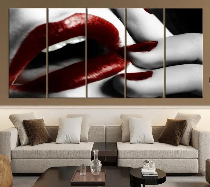 The wall features a black and white photo titled "Red Lips and Women Canvas Print," adding a touch of bold elegance to the room's contemporary art collection.