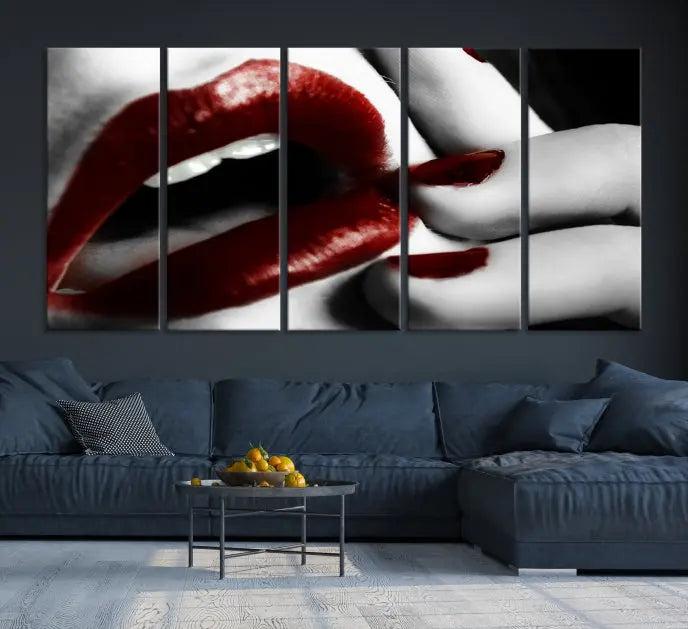 The wall features a black and white photo titled "Red Lips and Women Canvas Print," adding a touch of bold elegance to the room's contemporary art collection.