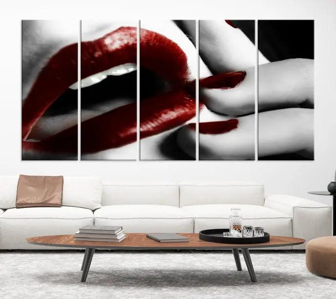 The wall features a black and white photo titled "Red Lips and Women Canvas Print," adding a touch of bold elegance to the room's contemporary art collection.