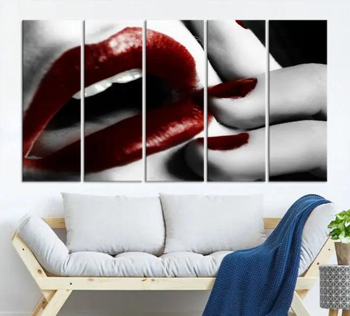 The wall features a black and white photo titled "Red Lips and Women Canvas Print," adding a touch of bold elegance to the room's contemporary art collection.