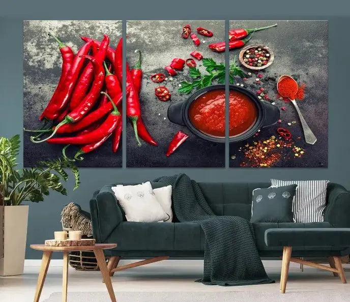 The museum-quality triptych titled "Red Pepper Kitchen and Restaurant Wall" beautifully showcases red chili peppers and spices. This gallery-wrapped canvas print artfully features a pot of red sauce, infusing vibrant energy into the decor.