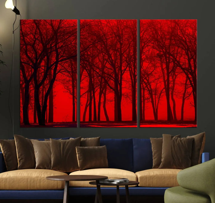 The "Red Sky and Forest Wall Art Print Triptych Canvas Print," with its striking silhouette of trees set against a vibrant red backdrop, adds a touch of elegance to any room. Enjoy this hand-assembled canvas masterpiece with free shipping.