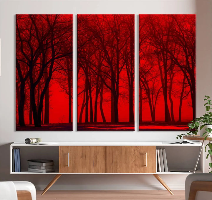 The "Red Sky and Forest Wall Art Print Triptych Canvas Print," with its striking silhouette of trees set against a vibrant red backdrop, adds a touch of elegance to any room. Enjoy this hand-assembled canvas masterpiece with free shipping.