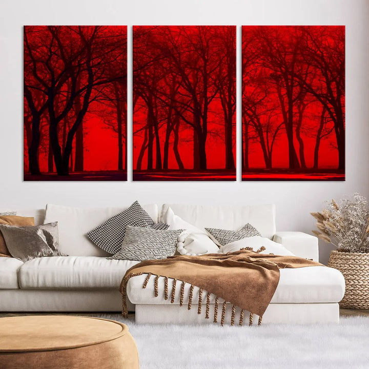 The "Red Sky and Forest Wall Art Print Triptych Canvas Print," with its striking silhouette of trees set against a vibrant red backdrop, adds a touch of elegance to any room. Enjoy this hand-assembled canvas masterpiece with free shipping.