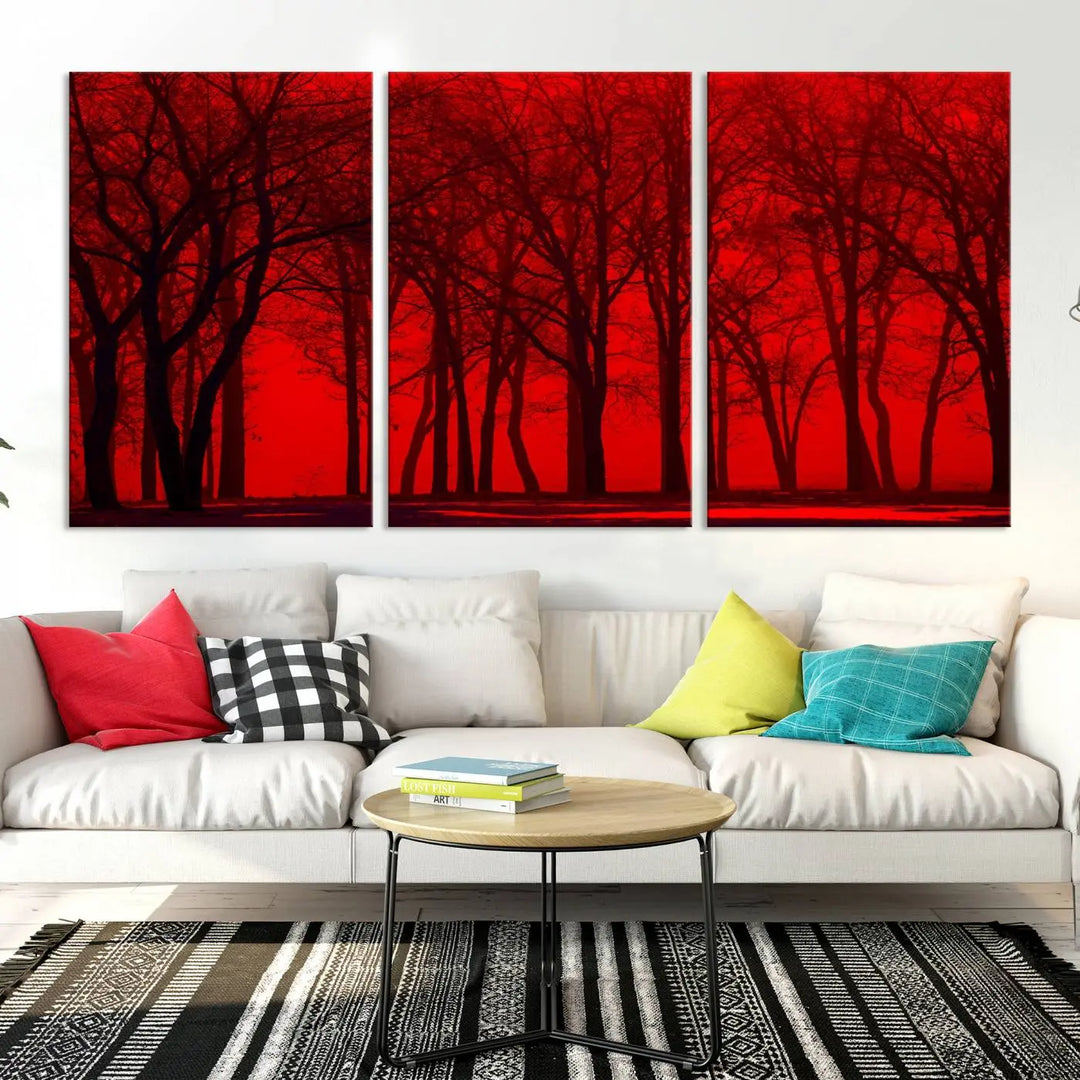 The "Red Sky and Forest Wall Art Print Triptych Canvas Print," with its striking silhouette of trees set against a vibrant red backdrop, adds a touch of elegance to any room. Enjoy this hand-assembled canvas masterpiece with free shipping.