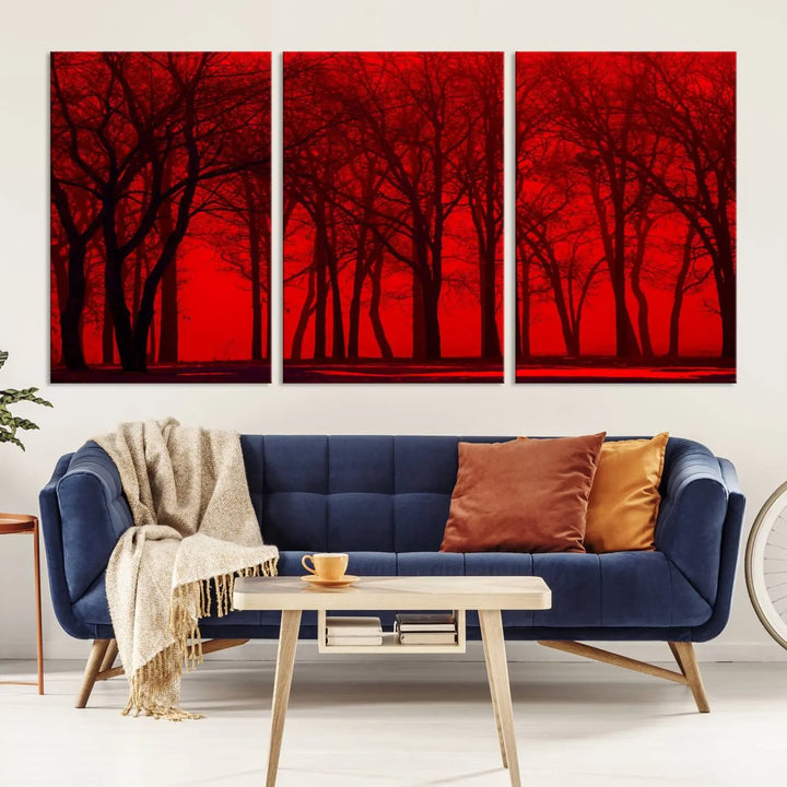 The "Red Sky and Forest Wall Art Print Triptych Canvas Print," with its striking silhouette of trees set against a vibrant red backdrop, adds a touch of elegance to any room. Enjoy this hand-assembled canvas masterpiece with free shipping.