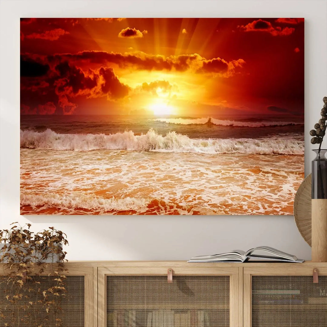 Red Sunset Ocean Beach Canvas Wall Art showcases a stunning three-panel masterpiece that captures a vivid beach sunset over ocean waves.