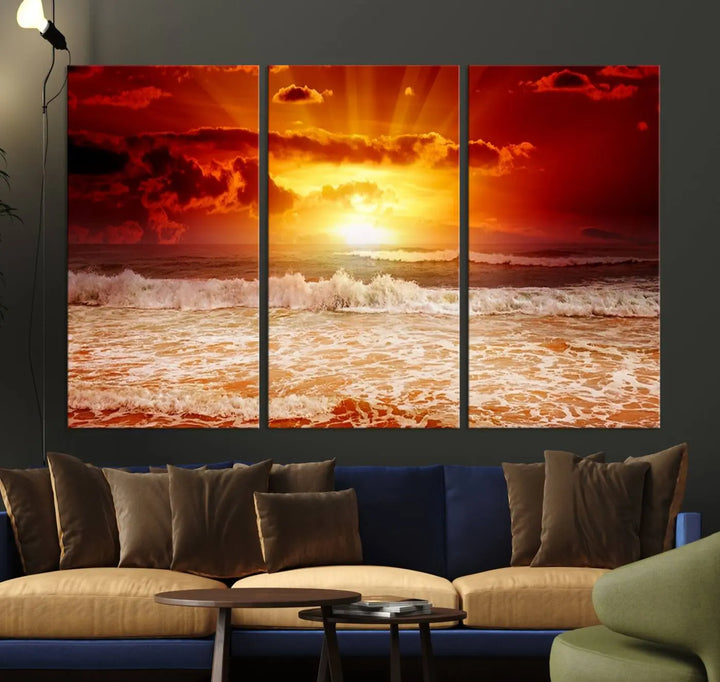 Red Sunset Ocean Beach Canvas Wall Art showcases a stunning three-panel masterpiece that captures a vivid beach sunset over ocean waves.