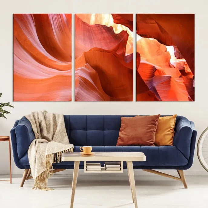 A triptych of Red Wave Shape Rock Form Antilop Canvas Wall Art, printed on museum-quality canvas, adorns the wall.