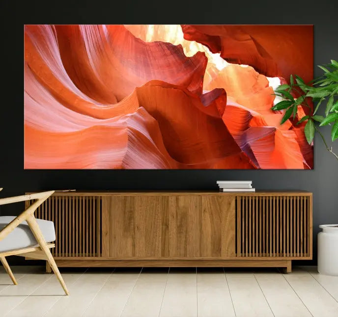 A triptych of Red Wave Shape Rock Form Antilop Canvas Wall Art, printed on museum-quality canvas, adorns the wall.