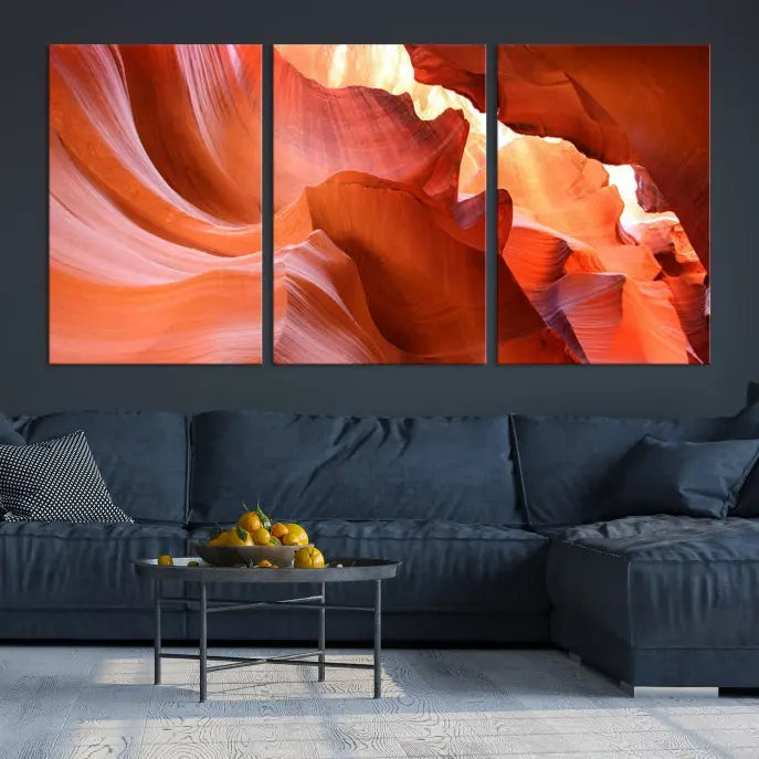 A triptych of Red Wave Shape Rock Form Antilop Canvas Wall Art, printed on museum-quality canvas, adorns the wall.