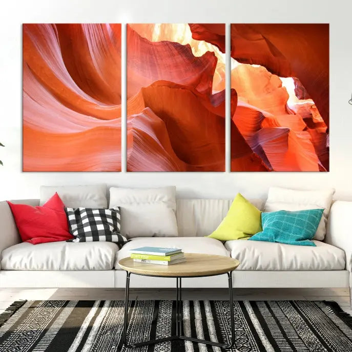 A triptych of Red Wave Shape Rock Form Antilop Canvas Wall Art, printed on museum-quality canvas, adorns the wall.