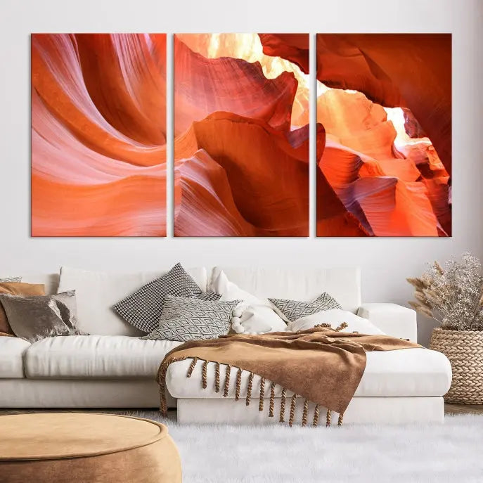 A triptych of Red Wave Shape Rock Form Antilop Canvas Wall Art, printed on museum-quality canvas, adorns the wall.