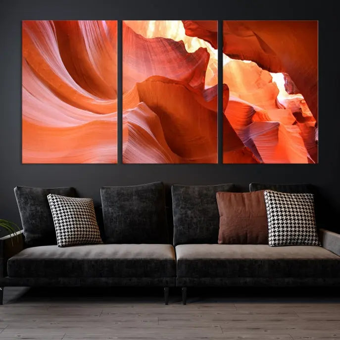 A triptych of Red Wave Shape Rock Form Antilop Canvas Wall Art, printed on museum-quality canvas, adorns the wall.