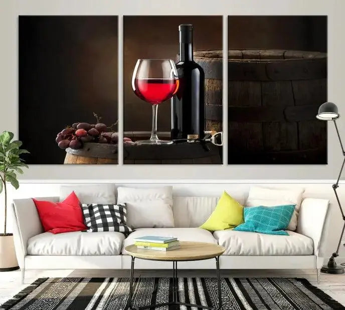 The wall art triptych on museum-quality canvas features the Red Wine and Bottle Canvas Print, showcasing wine, a glass, grapes, and barrels. The gallery-wrapped pieces ensure elegance while the UV-protective coating preserves their vibrant charm.