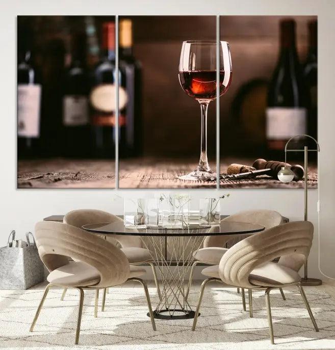 The "Red Wine and Bottle Canvas Print" is a triptych on museum-quality canvas, featuring a glass of red wine with subtle depictions of wine bottles and corks in the background, all beautifully gallery wrapped.