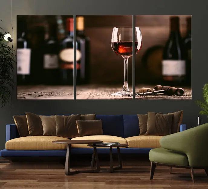 The "Red Wine and Bottle Canvas Print" is a triptych on museum-quality canvas, featuring a glass of red wine with subtle depictions of wine bottles and corks in the background, all beautifully gallery wrapped.