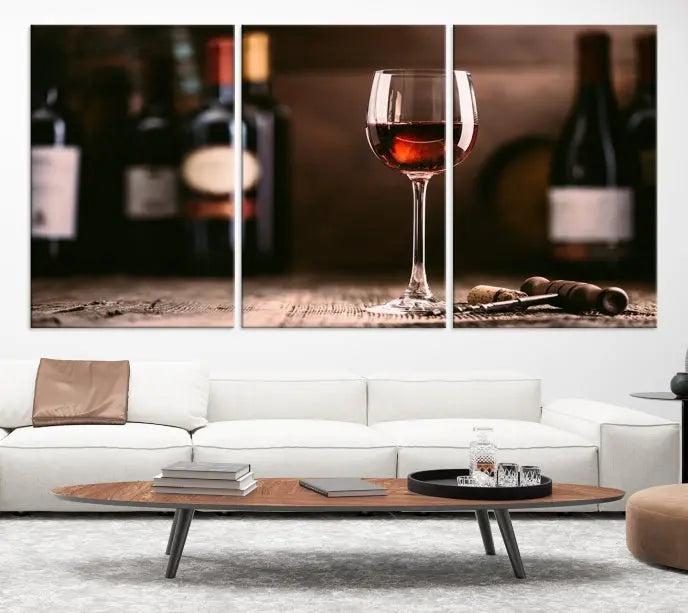 The "Red Wine and Bottle Canvas Print" is a triptych on museum-quality canvas, featuring a glass of red wine with subtle depictions of wine bottles and corks in the background, all beautifully gallery wrapped.