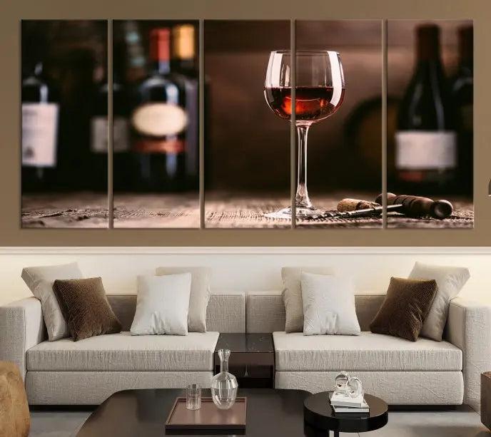 The "Red Wine and Bottle Canvas Print" is a triptych on museum-quality canvas, featuring a glass of red wine with subtle depictions of wine bottles and corks in the background, all beautifully gallery wrapped.