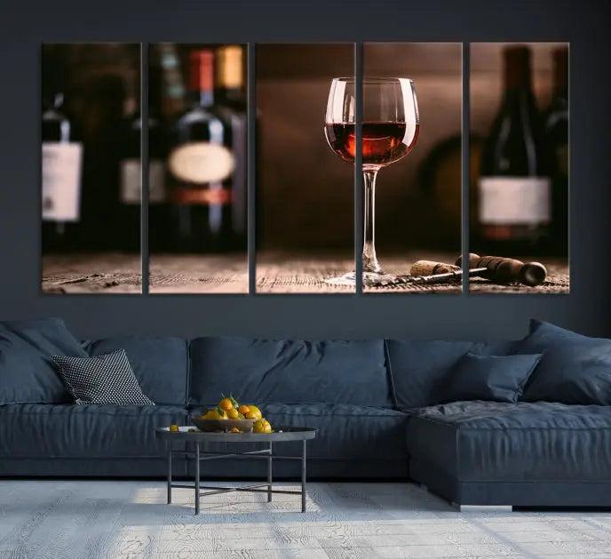 The "Red Wine and Bottle Canvas Print" is a triptych on museum-quality canvas, featuring a glass of red wine with subtle depictions of wine bottles and corks in the background, all beautifully gallery wrapped.