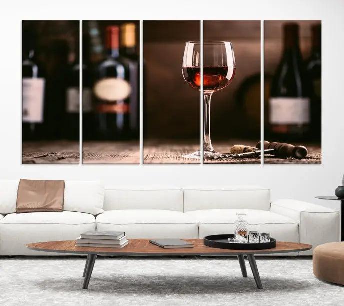 The "Red Wine and Bottle Canvas Print" is a triptych on museum-quality canvas, featuring a glass of red wine with subtle depictions of wine bottles and corks in the background, all beautifully gallery wrapped.