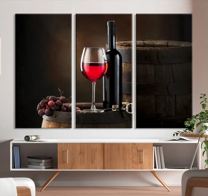 The wall art triptych on museum-quality canvas features the Red Wine and Bottle Canvas Print, showcasing wine, a glass, grapes, and barrels. The gallery-wrapped pieces ensure elegance while the UV-protective coating preserves their vibrant charm.