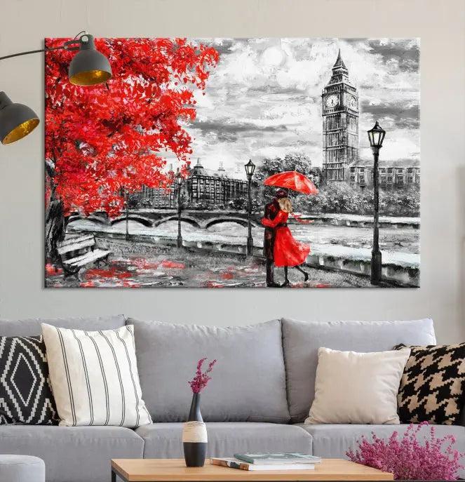 The "Red and Love in London Canvas Print" showcases a red-accented scene of a couple near Big Ben, surrounded by vibrant red trees. Designed on museum-quality canvas with a UV-protective coating, this artwork is ready to hang and adds an elegant touch to any room.