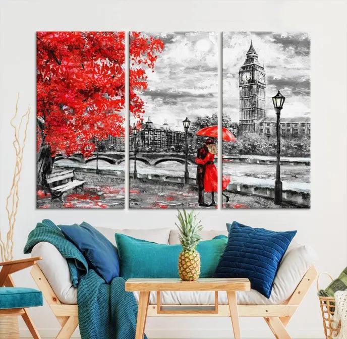 The "Red and Love in London Canvas Print" showcases a red-accented scene of a couple near Big Ben, surrounded by vibrant red trees. Designed on museum-quality canvas with a UV-protective coating, this artwork is ready to hang and adds an elegant touch to any room.