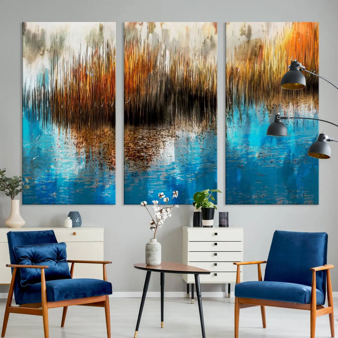 The "Restful Landscape Art Abstract Lake Canvas Print Wall Art" showcases a spectrum of vibrant blue, orange, and brown hues on museum-quality canvas. It comes with UV-protective coating and is ready to hang.