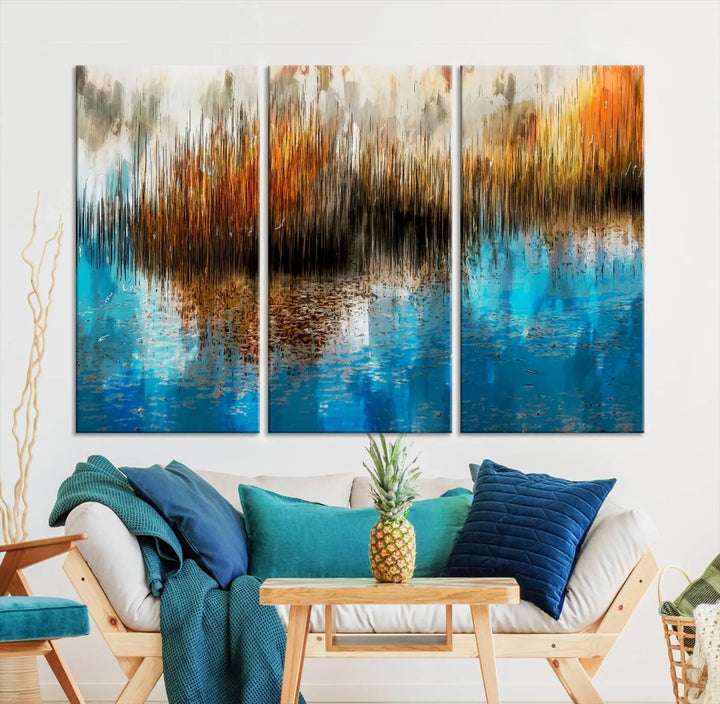 The "Restful Landscape Art Abstract Lake Canvas Print Wall Art" showcases a spectrum of vibrant blue, orange, and brown hues on museum-quality canvas. It comes with UV-protective coating and is ready to hang.