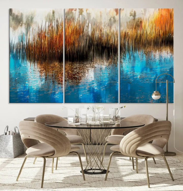 The "Restful Landscape Art Abstract Lake Canvas Print Wall Art" showcases a spectrum of vibrant blue, orange, and brown hues on museum-quality canvas. It comes with UV-protective coating and is ready to hang.