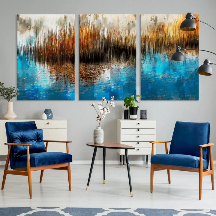 The "Restful Landscape Art Abstract Lake Canvas Print Wall Art" showcases a spectrum of vibrant blue, orange, and brown hues on museum-quality canvas. It comes with UV-protective coating and is ready to hang.