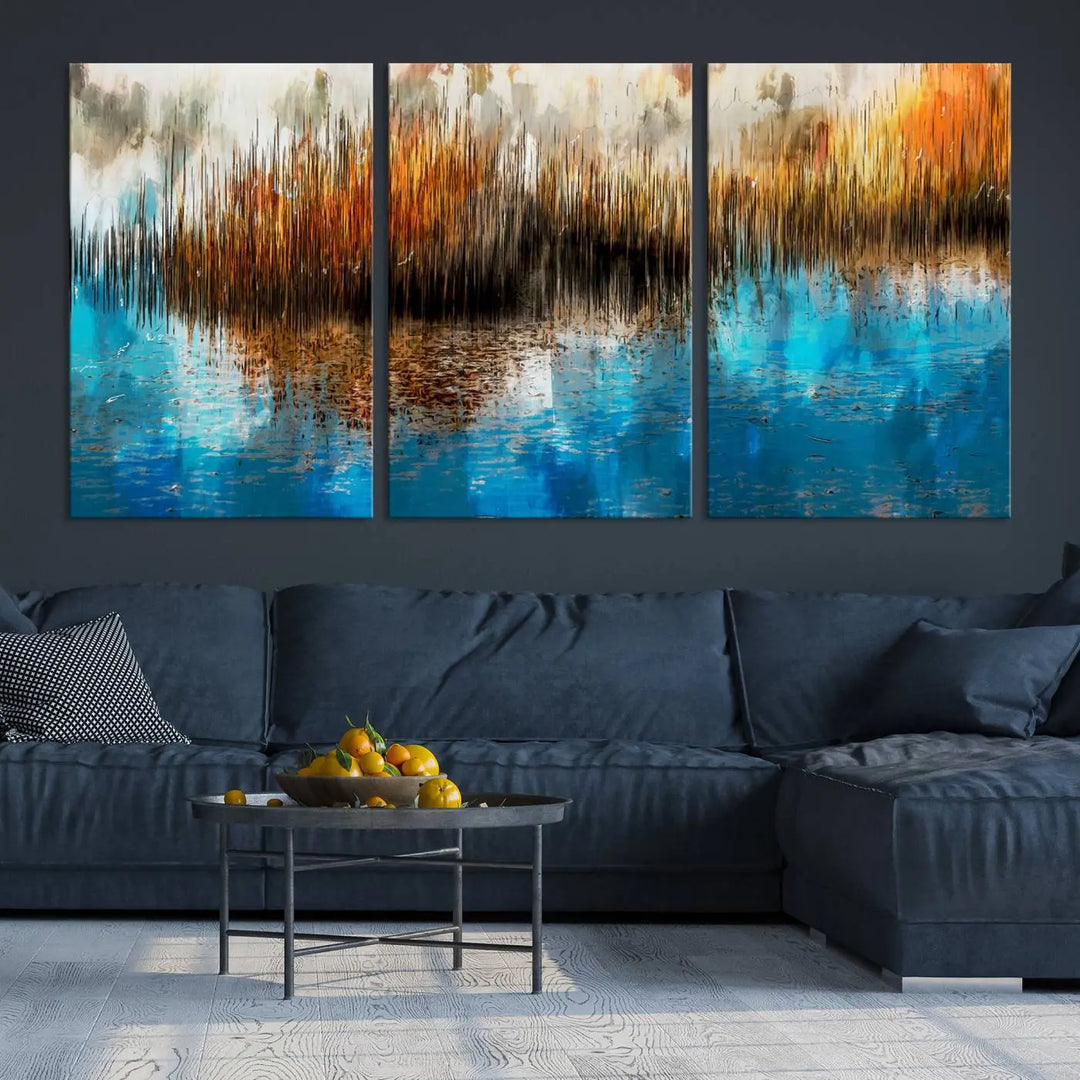 The "Restful Landscape Art Abstract Lake Canvas Print Wall Art" showcases a spectrum of vibrant blue, orange, and brown hues on museum-quality canvas. It comes with UV-protective coating and is ready to hang.