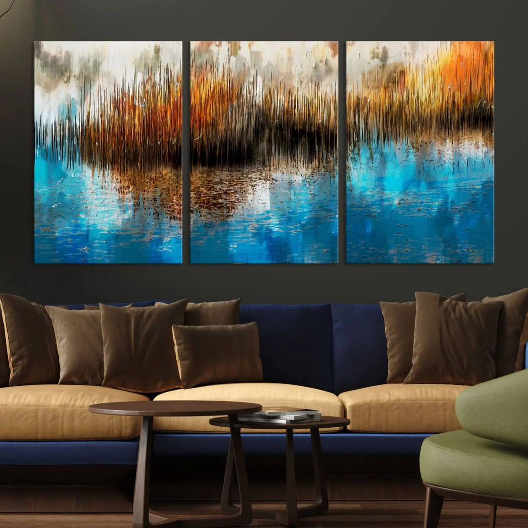 The "Restful Landscape Art Abstract Lake Canvas Print Wall Art" showcases a spectrum of vibrant blue, orange, and brown hues on museum-quality canvas. It comes with UV-protective coating and is ready to hang.