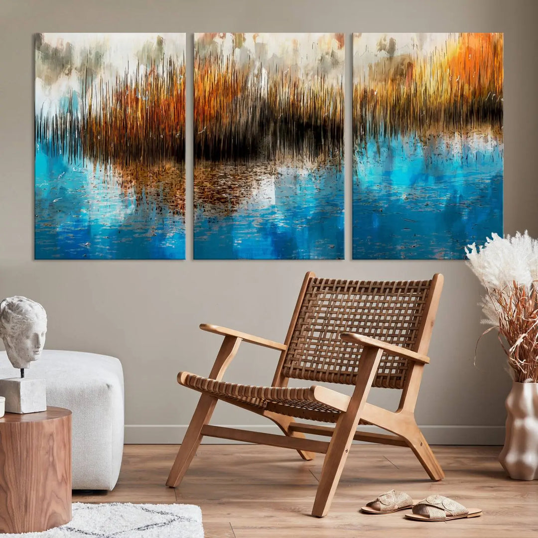 The "Restful Landscape Art Abstract Lake Canvas Print Wall Art" showcases a spectrum of vibrant blue, orange, and brown hues on museum-quality canvas. It comes with UV-protective coating and is ready to hang.