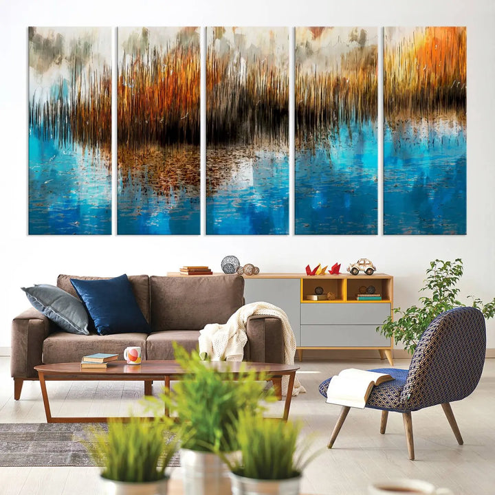 The "Restful Landscape Art Abstract Lake Canvas Print Wall Art" showcases a spectrum of vibrant blue, orange, and brown hues on museum-quality canvas. It comes with UV-protective coating and is ready to hang.