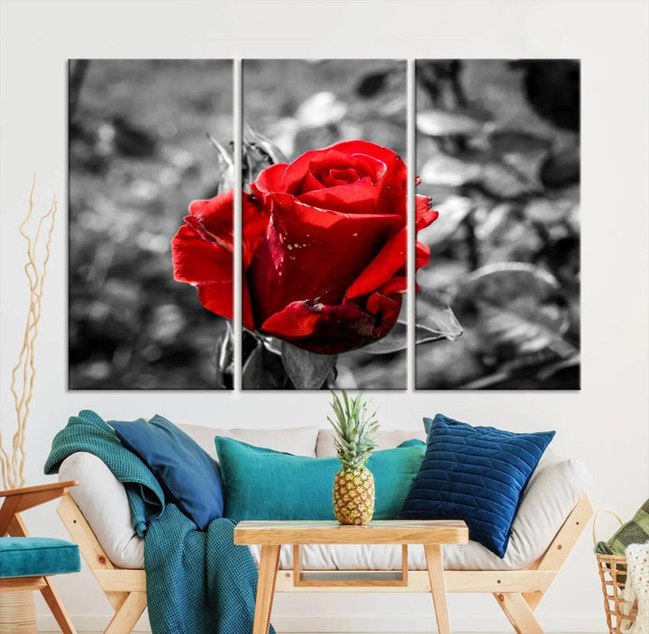 The living room boasts the exquisite Rose Canvas Wall Art—a three-panel masterpiece showcasing a red rose against a black and white background. This artwork is created on museum-quality canvas and finished with a UV-protective coating, ensuring lasting vibrancy in every professionally crafted piece.