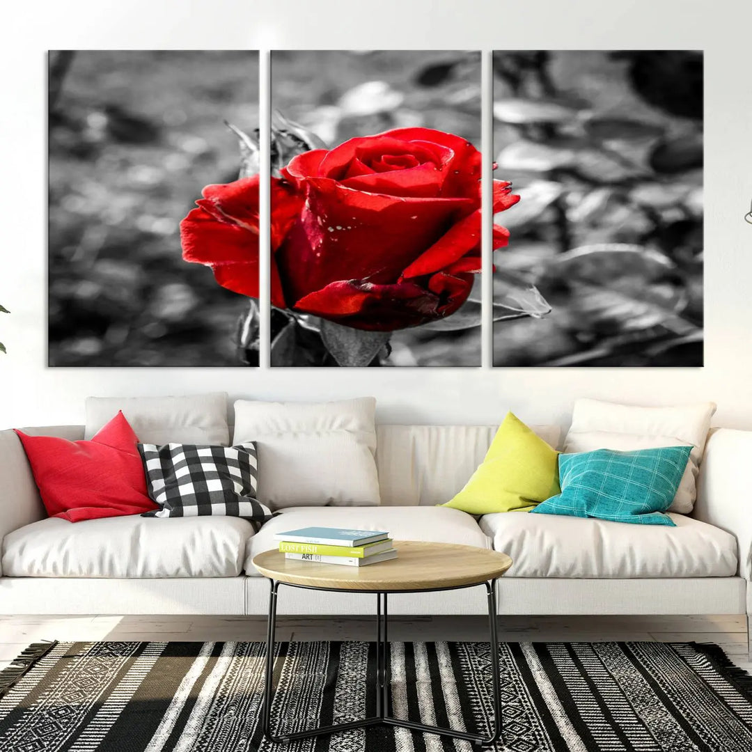 The living room boasts the exquisite Rose Canvas Wall Art—a three-panel masterpiece showcasing a red rose against a black and white background. This artwork is created on museum-quality canvas and finished with a UV-protective coating, ensuring lasting vibrancy in every professionally crafted piece.