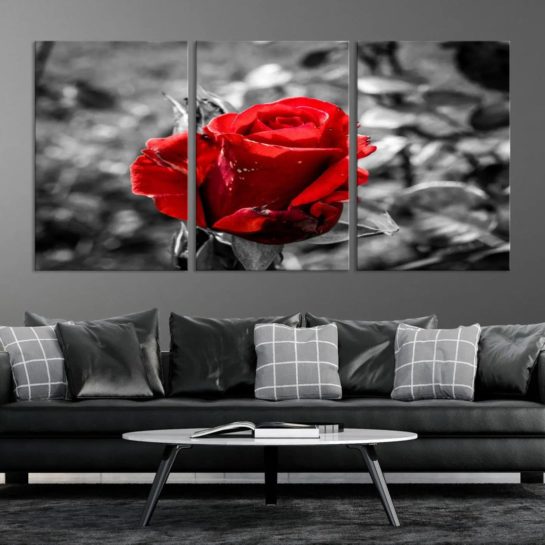 The living room boasts the exquisite Rose Canvas Wall Art—a three-panel masterpiece showcasing a red rose against a black and white background. This artwork is created on museum-quality canvas and finished with a UV-protective coating, ensuring lasting vibrancy in every professionally crafted piece.