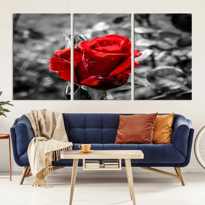 The living room boasts the exquisite Rose Canvas Wall Art—a three-panel masterpiece showcasing a red rose against a black and white background. This artwork is created on museum-quality canvas and finished with a UV-protective coating, ensuring lasting vibrancy in every professionally crafted piece.