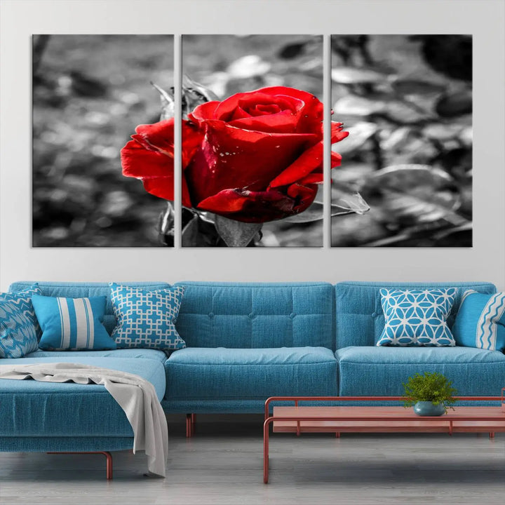 The living room boasts the exquisite Rose Canvas Wall Art—a three-panel masterpiece showcasing a red rose against a black and white background. This artwork is created on museum-quality canvas and finished with a UV-protective coating, ensuring lasting vibrancy in every professionally crafted piece.