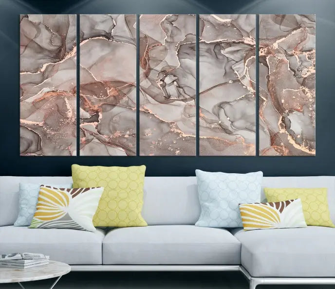 The Rose Gold Marble Fluid Effect Wall Art Abstract Canvas Wall Art Print is an exquisite three-panel creation crafted on museum-quality canvas. It features swirling marbled patterns in shades of gray, copper, and beige. Complete with a UV-protective coating, this ready-to-hang artwork promises to be a timeless addition to any space.