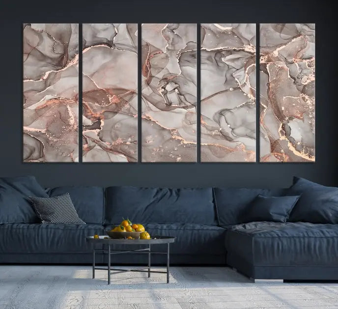 The Rose Gold Marble Fluid Effect Wall Art Abstract Canvas Wall Art Print is an exquisite three-panel creation crafted on museum-quality canvas. It features swirling marbled patterns in shades of gray, copper, and beige. Complete with a UV-protective coating, this ready-to-hang artwork promises to be a timeless addition to any space.